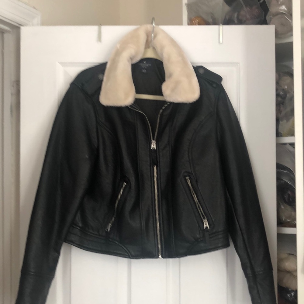 Black faux leather jacket with faux cream furry collar
